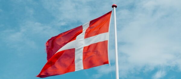 Danish flag with the sky as the backdrop