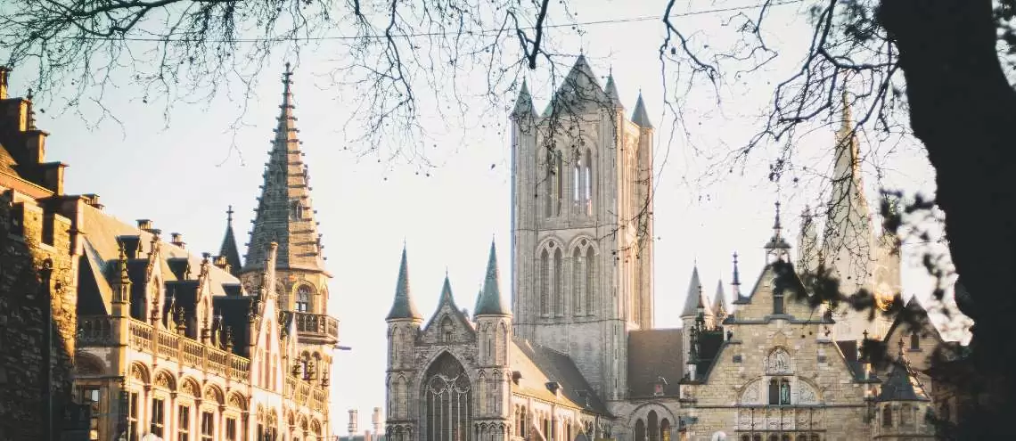 Ghent is a romantic town with beautiful university campuses, waterways, and medical buildings. 