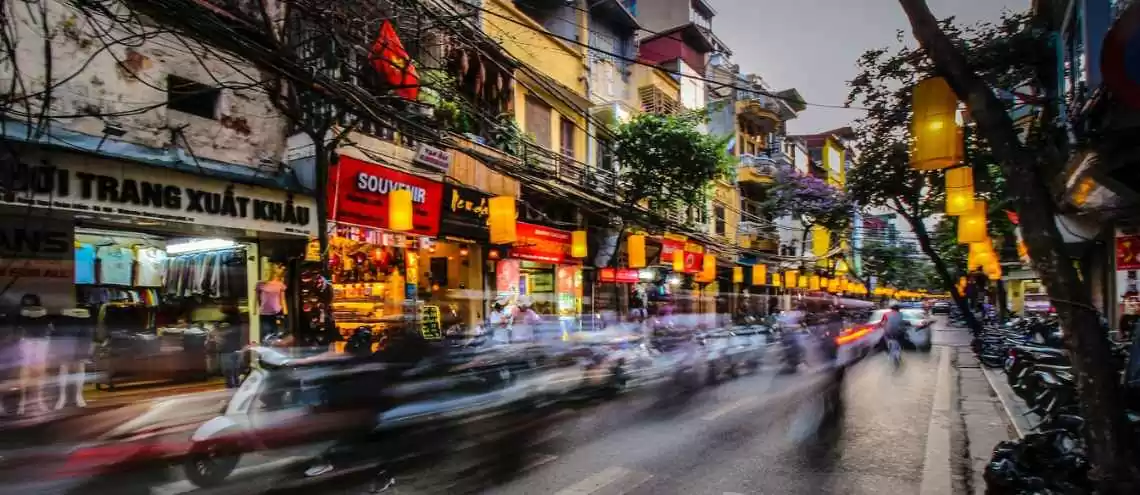 A photo of a busy street in the heart of the city, Hanoi, Vietnam 