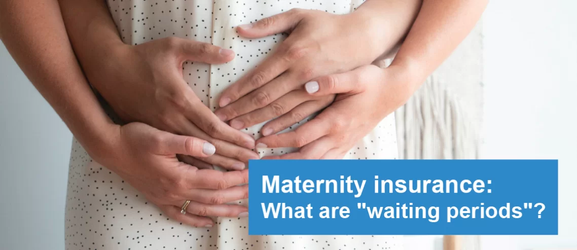 A couple hugging the mother's pregnant baby, confused by maternity waiting periods..