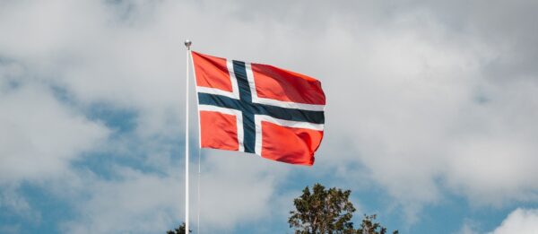 Norwegian flag with the sky as the backdrop