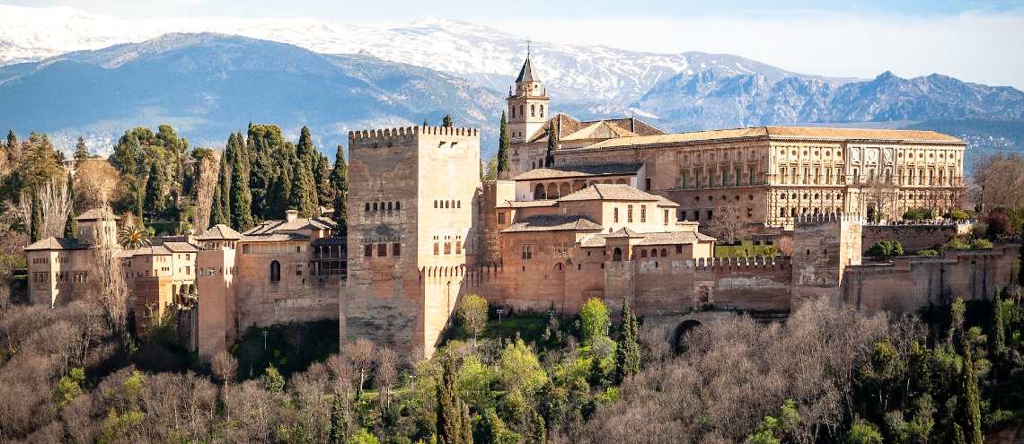 Granada is a small, charming city that is more affordable than Barcelona and Madrid.
