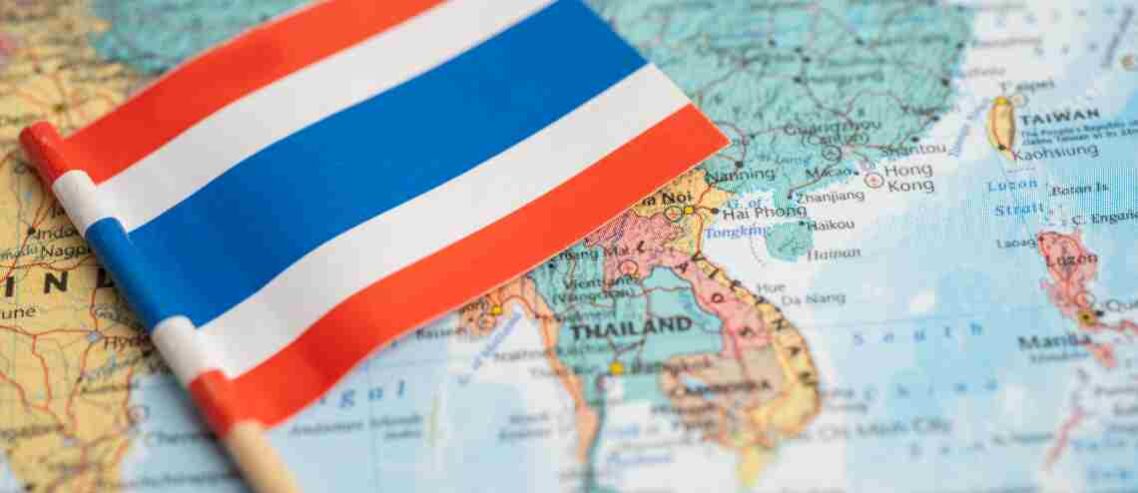Tiny Thai flag on the map next to Thailand