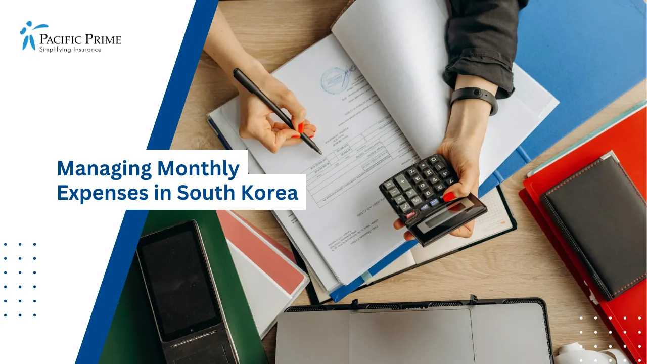 Image of Accountant Reviewing Financial Papers With Calculator At Desk with text overlay of "Managing Monthly Expenses in South Korea"