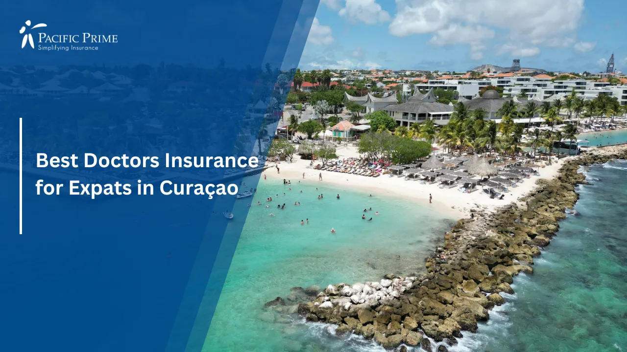 Image of Aerial View Of Jan Thiel Beach With Clear Blue Waters In Curaçao with text overlay of "Best Doctors Insurance for Expats in Curaçao"