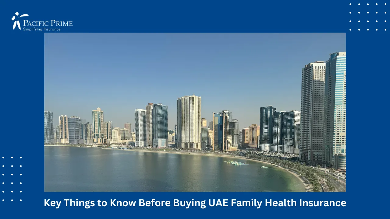 Image of Al Majaz Sharjah Waterfront With High-rise Buildings with text overlay of "Key Things to Know Before Buying UAE Family Health Insurance"