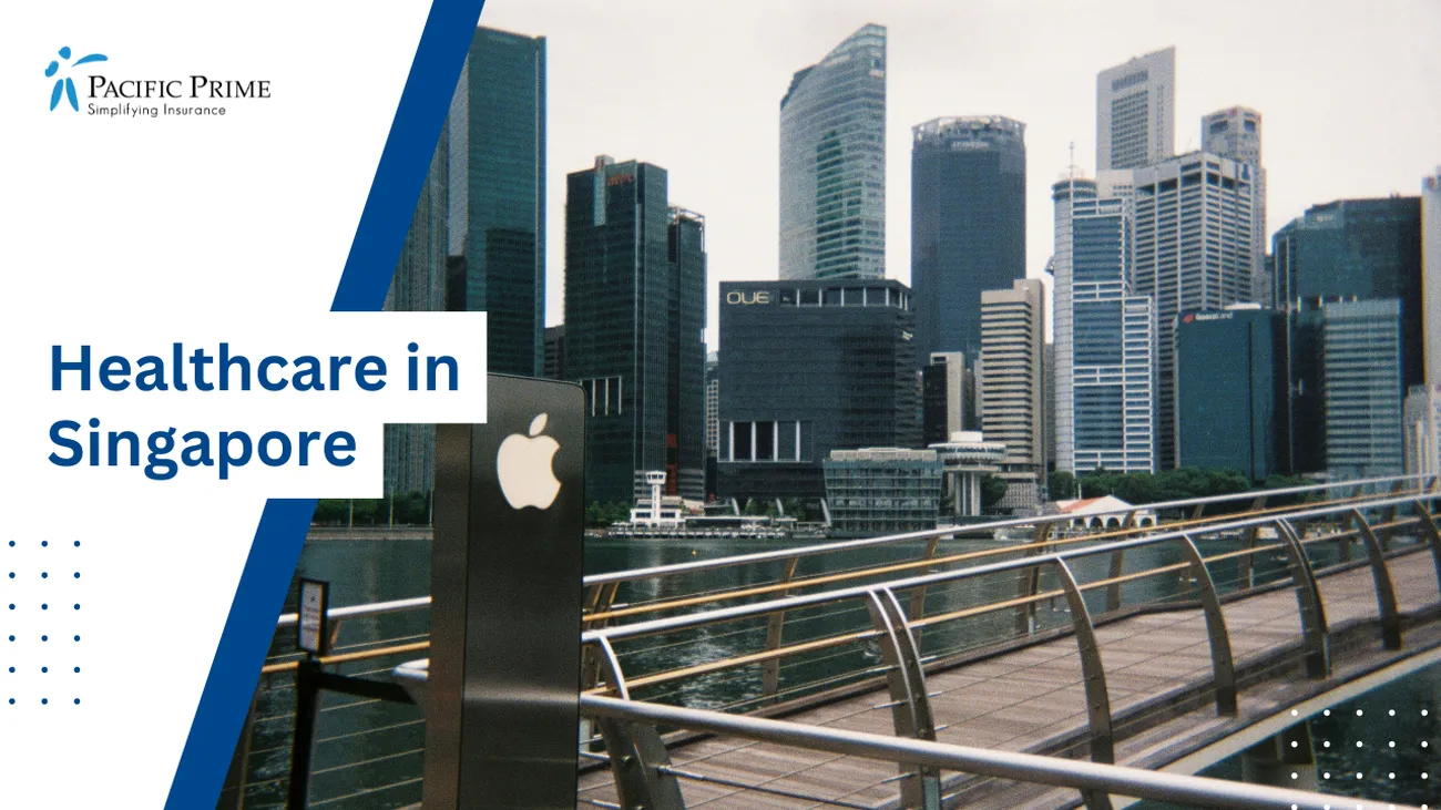 Image of Apple Sign On A Bridge At Bayfront Avenue With City Skyline, Singapore with text overlay of "Healthcare in Singapore"
