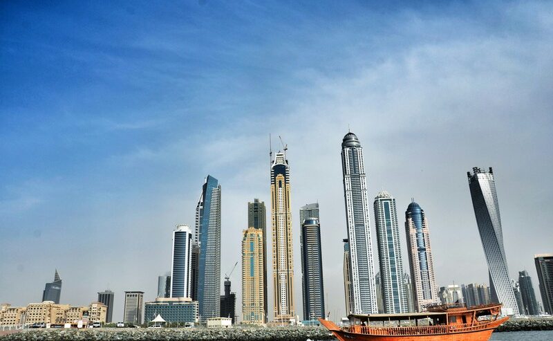 Boat Amidst Towering Dubai Skyline