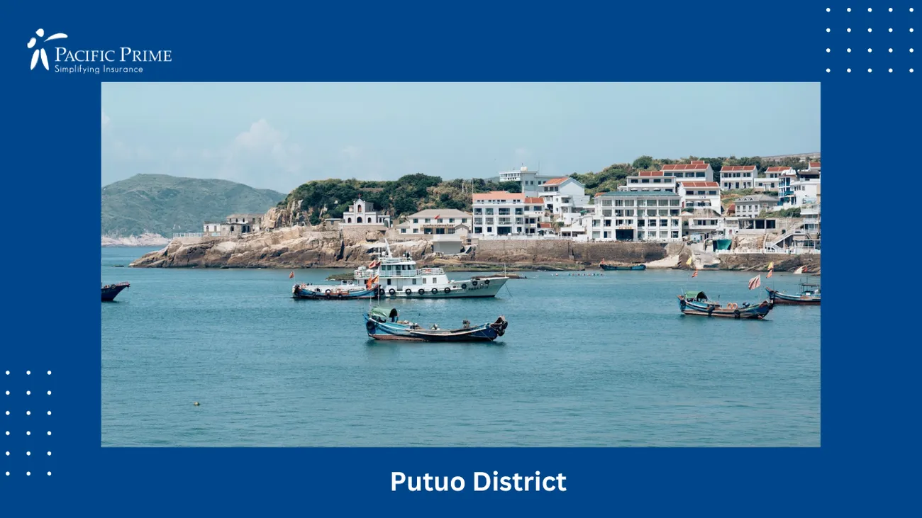 Image of Boats Afloat On Water In Dong Ji Zhen, Putuo, Shanghai With People with text overlay of "Putuo District"