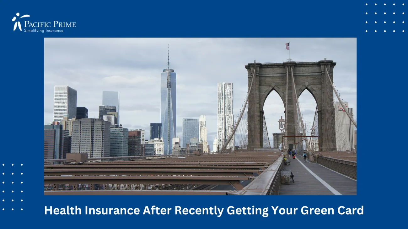 Image of Brooklyn Bridge In New York City, USA, With Skyline In The Background with text overlay of "Health Insurance After Recently Getting Your Green Card"