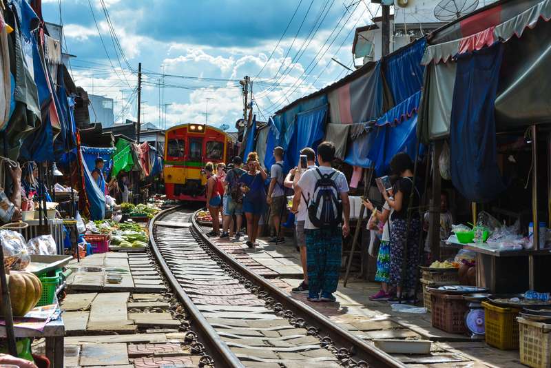 Bustling Maeklong Market, Samutsongkhram, In Migrant Health Insurance Article