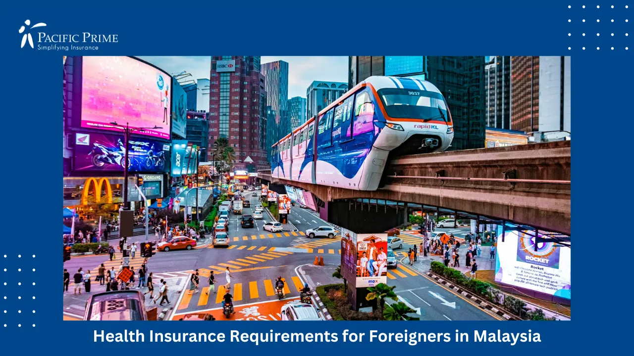 Image of Busy Street With Traffic And High-rise Buildings In Bukit Bintang with text overlay of "Health Insurance Requirements for Foreigners in Malaysia"
