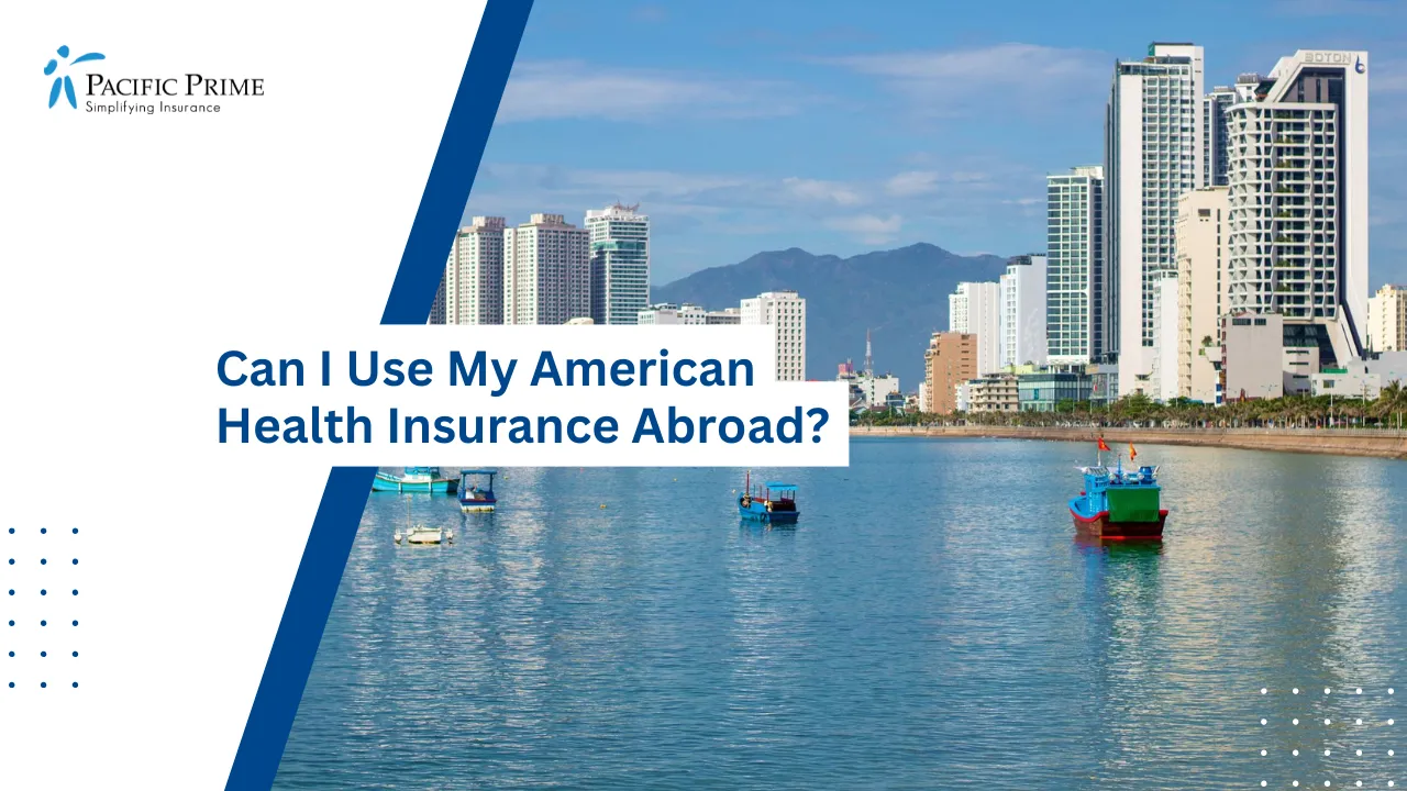Image of Colorful Boats Dot Nha Trang’s Calm Waterfront Beneath A Mountain-framed Skyline with text overlay of "Can I Use My American Health Insurance Abroad?"
