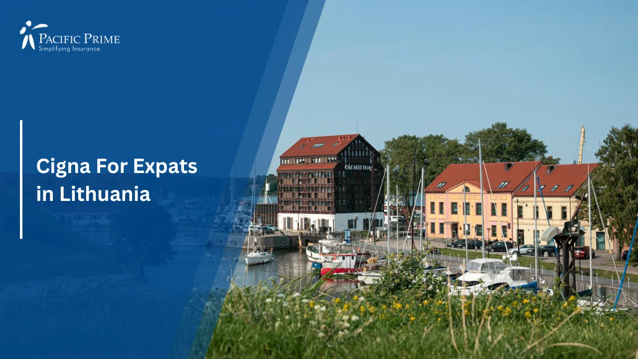 Image of Colorful Waterfront Houses In Klaipėda By The Water During Daytime with text overlay of "Cigna For Expats in Lithuania"