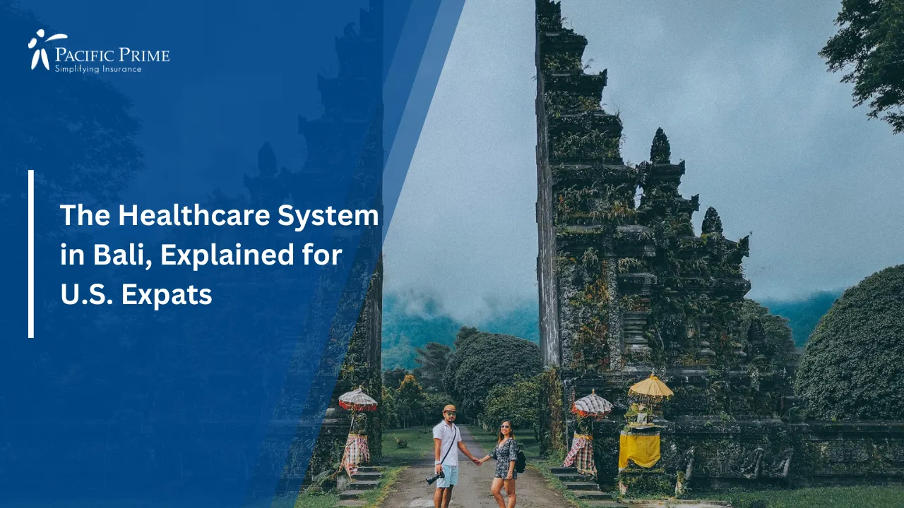 Image of Couple Standing At The Iconic Handara Gate In Bali with text overlay of "The Healthcare System in Bali, Explained for U.S. Expats"