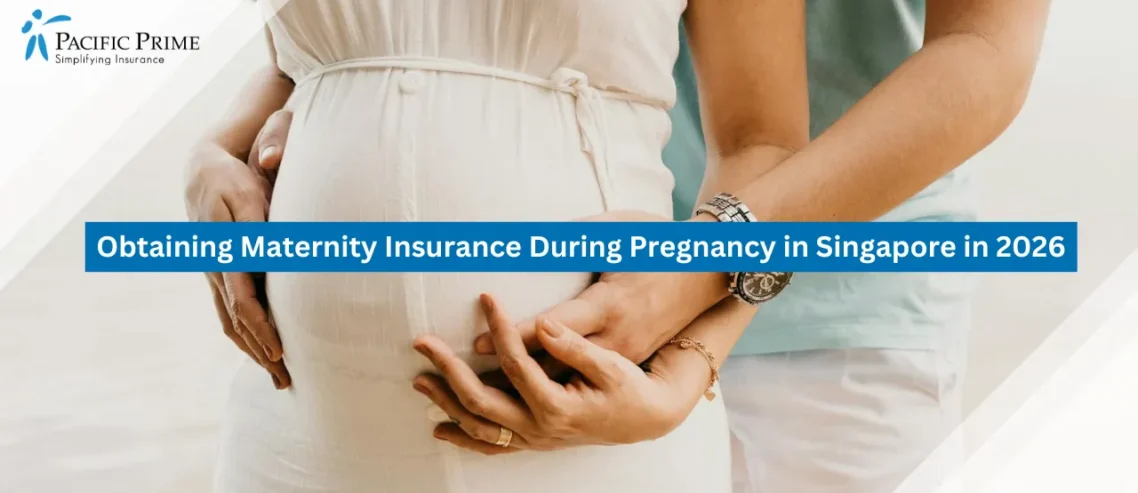 Image of Couple Standing By The Sea As Husband Gently Embraces Pregnant Partner’s Belly with text overlay of "Obtaining Maternity Insurance During Pregnancy in Singapore in 2026"