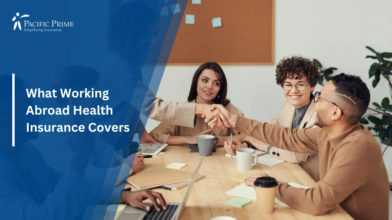 Image of Coworkers Shaking Hands In A Professional Setting with text overlay of "What Working Abroad Health Insurance Covers"