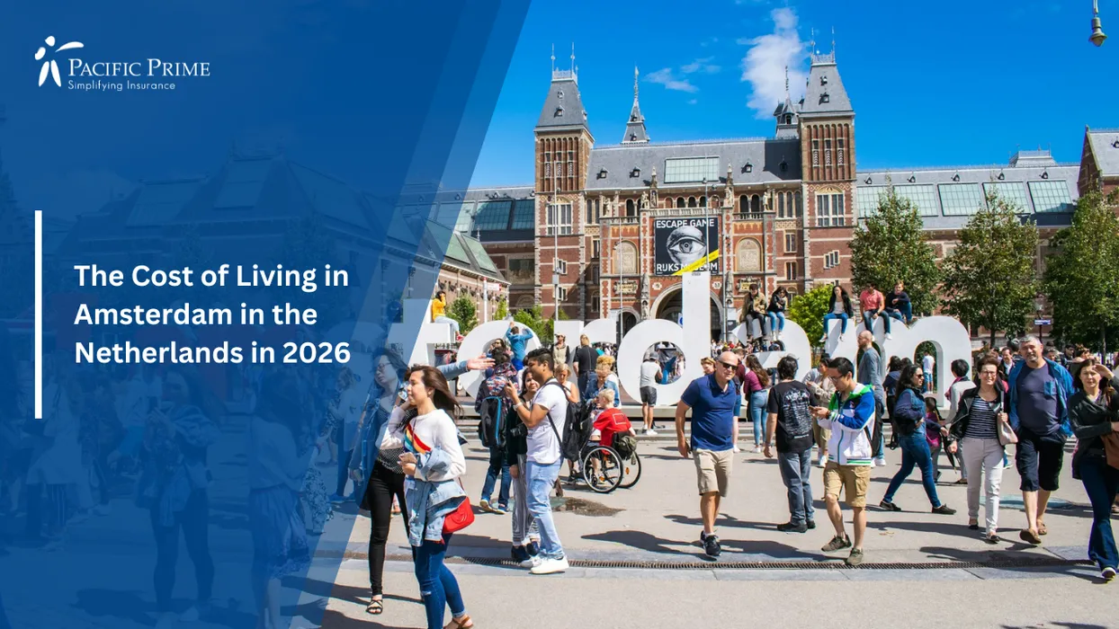 Image of Crowd Gathered Outside A Contemporary Dutch Building During Daytime with text overlay of "The Cost of Living in Amsterdam in the Netherlands in 2026"