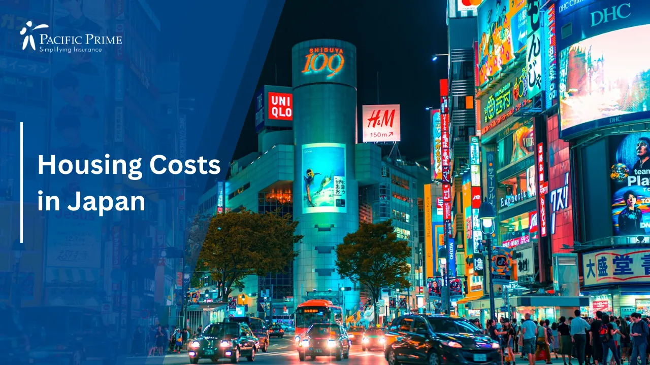 Image of Crowd Of People And Traffic Near Buildings In Shibuya, Tokyo with text overlay of "Housing Costs in Japan"