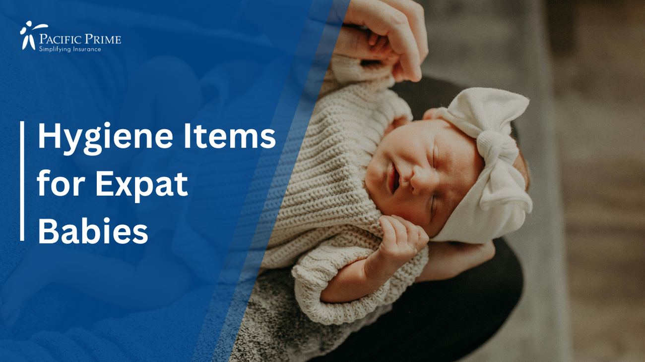 Image of a Dad With Daughter On Lap - Expat Family Bonding Moment with text overlay of "Hygiene Items for Expat Babies"