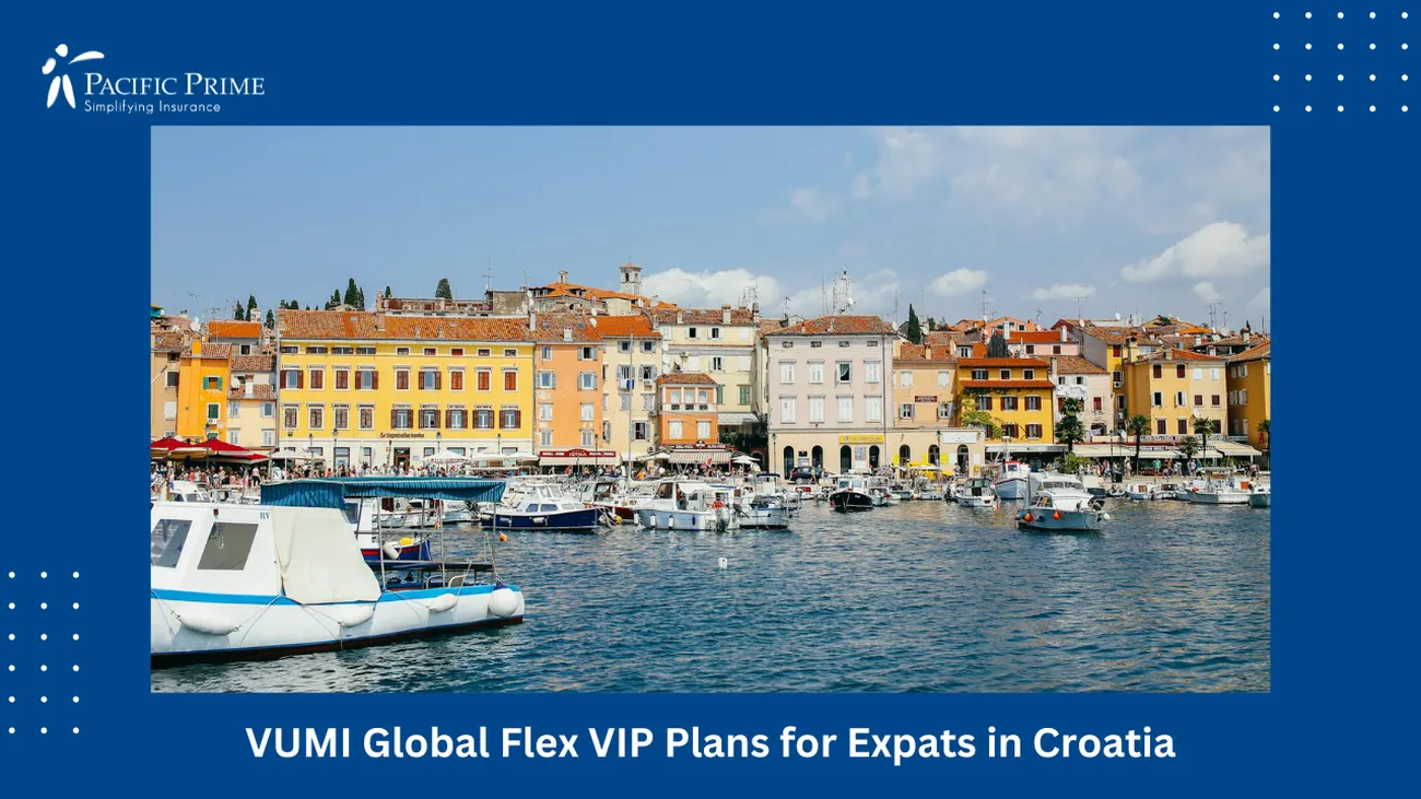 Image of Docked Boats Near Waterfront Buildings In Rovinj, Croatia with text overlay of "VUMI Global Flex VIP Plans for Expats in Croatia"
