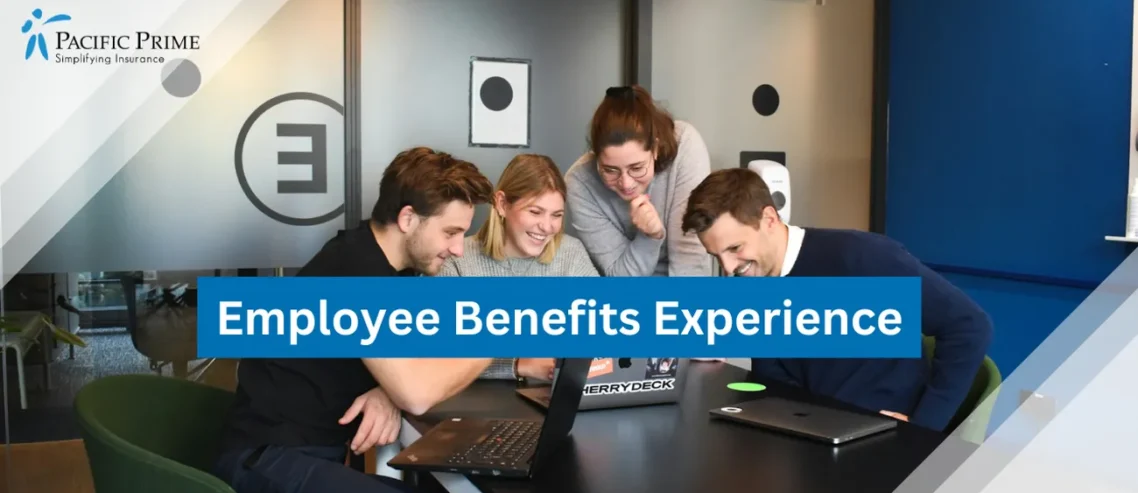 Image of Employees Seated, Working On Laptops In A Modern Office with text overlay of "Employee Benefits Experience"