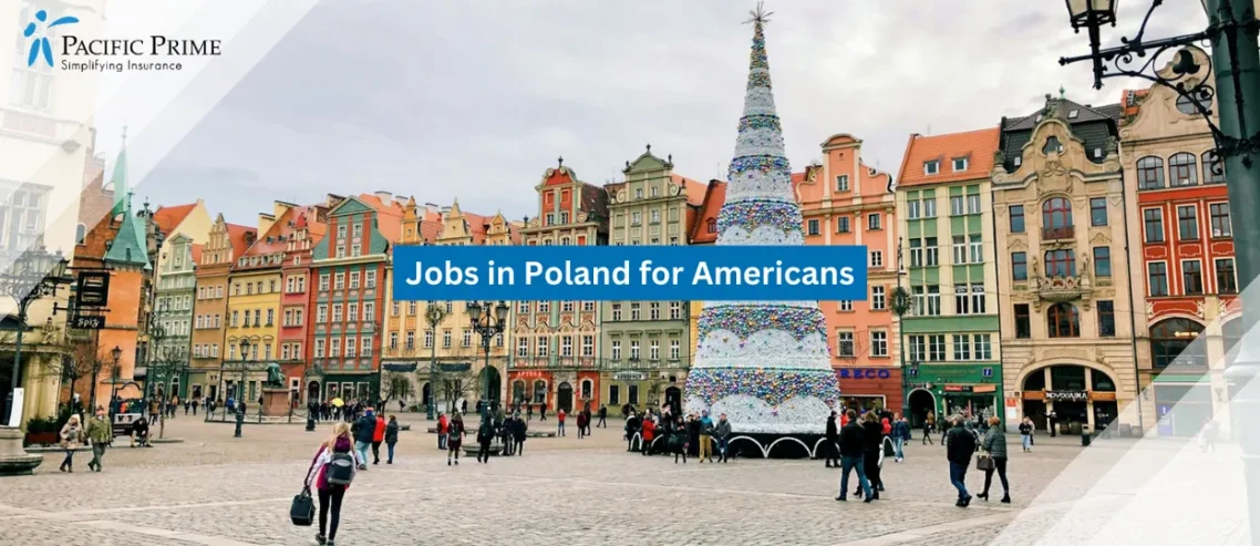 Image of Festive Lights And Holiday Market Stalls Decorating Wroclaw’s Old Town Square In Winter with text overlay of "Jobs in Poland for Americans"
