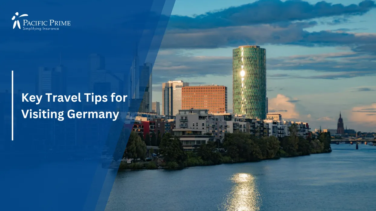 Image of Frankfurt Skyline With Glass Towers Lining The Riverfront Under Clear Skies with text overlay of "Key Travel Tips for Visiting Germany"