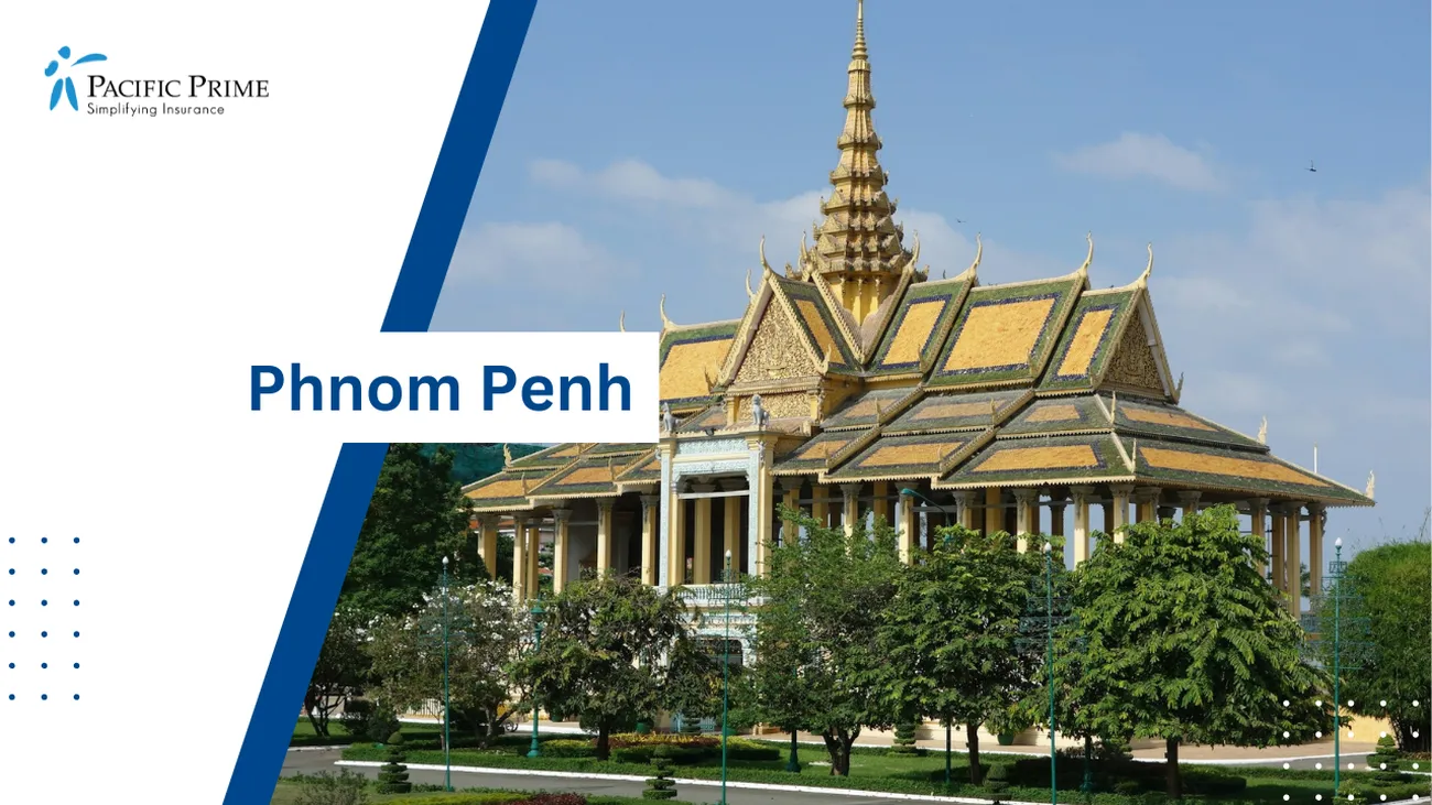 Image of Grand Building With A Golden Roof Surrounded By Trees In Phnom Penh, Cambodia with text overlay of "Phnom Penh"