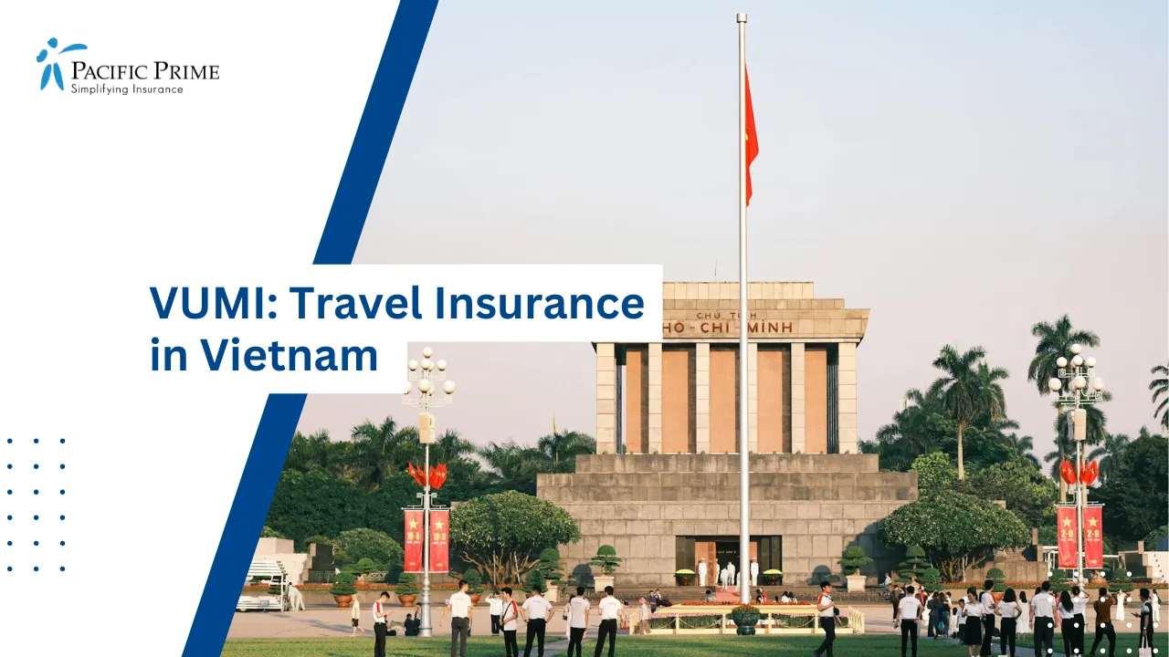 Image of Group Of People Gathered Near A Monument In Hanoi, Vietnam with text overlay of "VUMI: Travel Insurance in Vietnam"