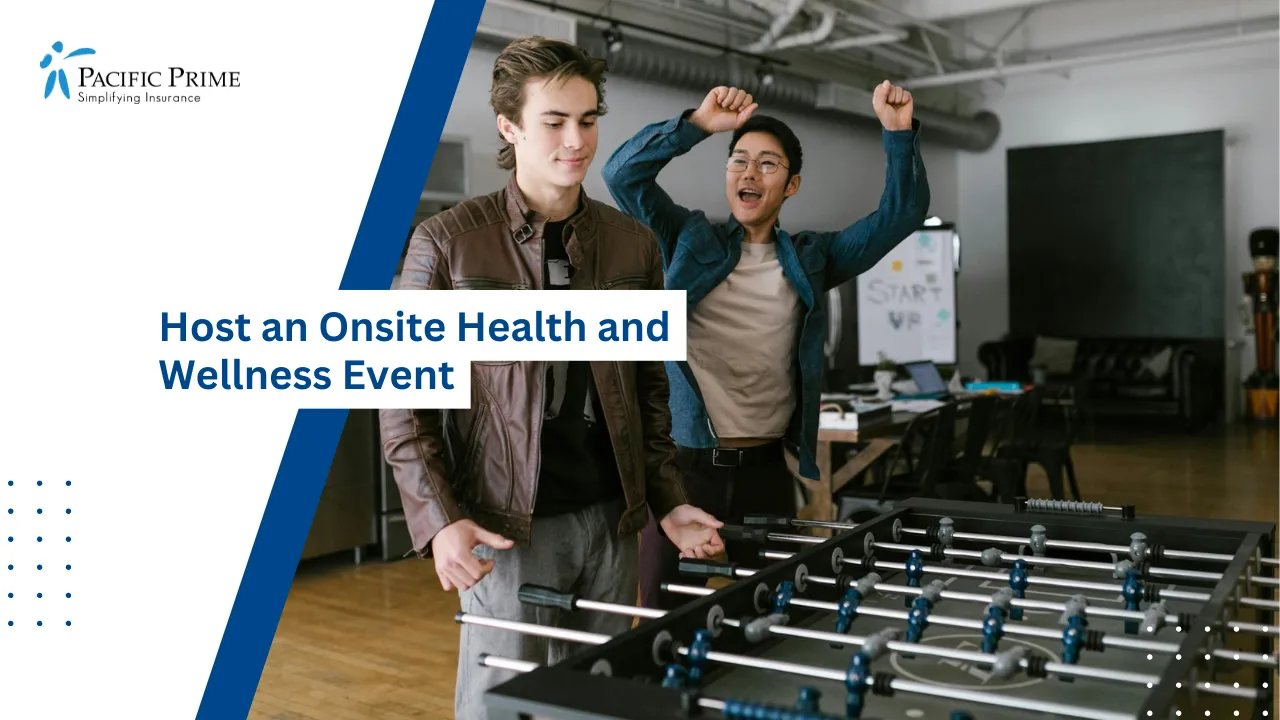 Image of Group Of People Playing Foosball Together Indoors with text overlay of "Host an Onsite Health and Wellness Event"
