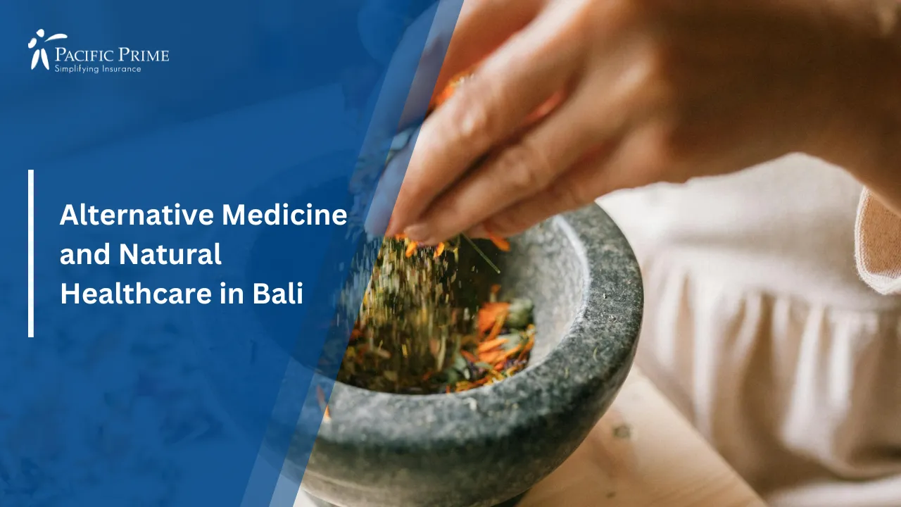 Image of Hands Grinding Dried Herbs And Petals In A Stone Mortar On Wooden Table with text overlay of "Alternative Medicine and Natural Healthcare in Bali"