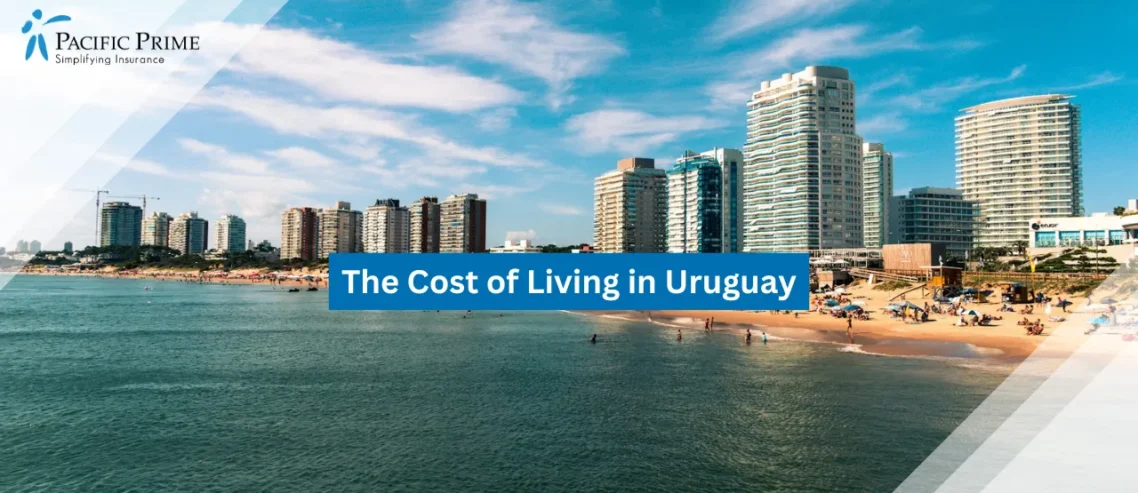 Image of High-rise Buildings By The Sea In Punta Del Este, Uruguay, Under Blue Sky with text overlay of "The Cost of Living in Uruguay"