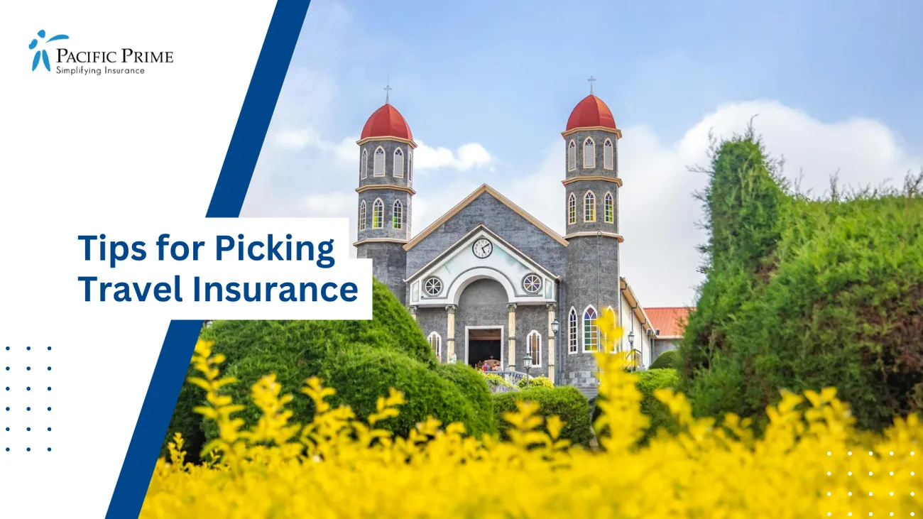 Image of Historic Catholic Church Surrounded By A Lush Garden Under A Blue Sky with text overlay of "Tips for Picking Travel Insurance"