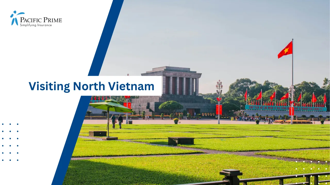 Image of Ho Chi Minh Mausoleum In Ba Dinh Square, Hanoi During Daytime with text overlay of "Visiting North Vietnam"
