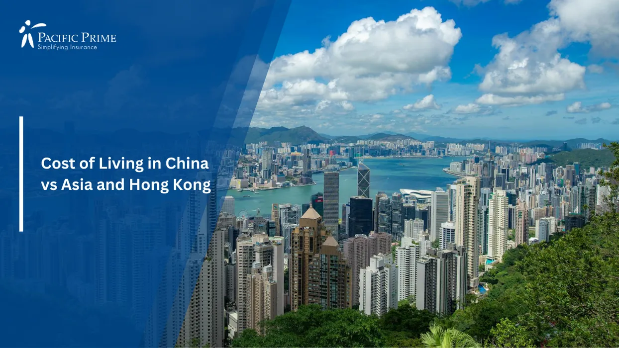 Image of Hong Kong Skyline Rising Above Victoria Harbour Beneath Bright Blue Skies with text overlay of "Cost of Living in China vs Asia and Hong Kong"