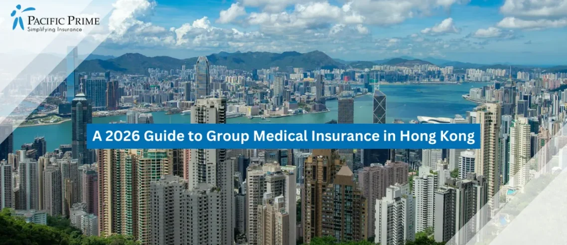 Image of Hong Kong Skyline Rising Beneath Bright Clouds And Clear Blue Skies with text overlay of "A 2026 Guide to Group Medical Insurance in Hong Kong"