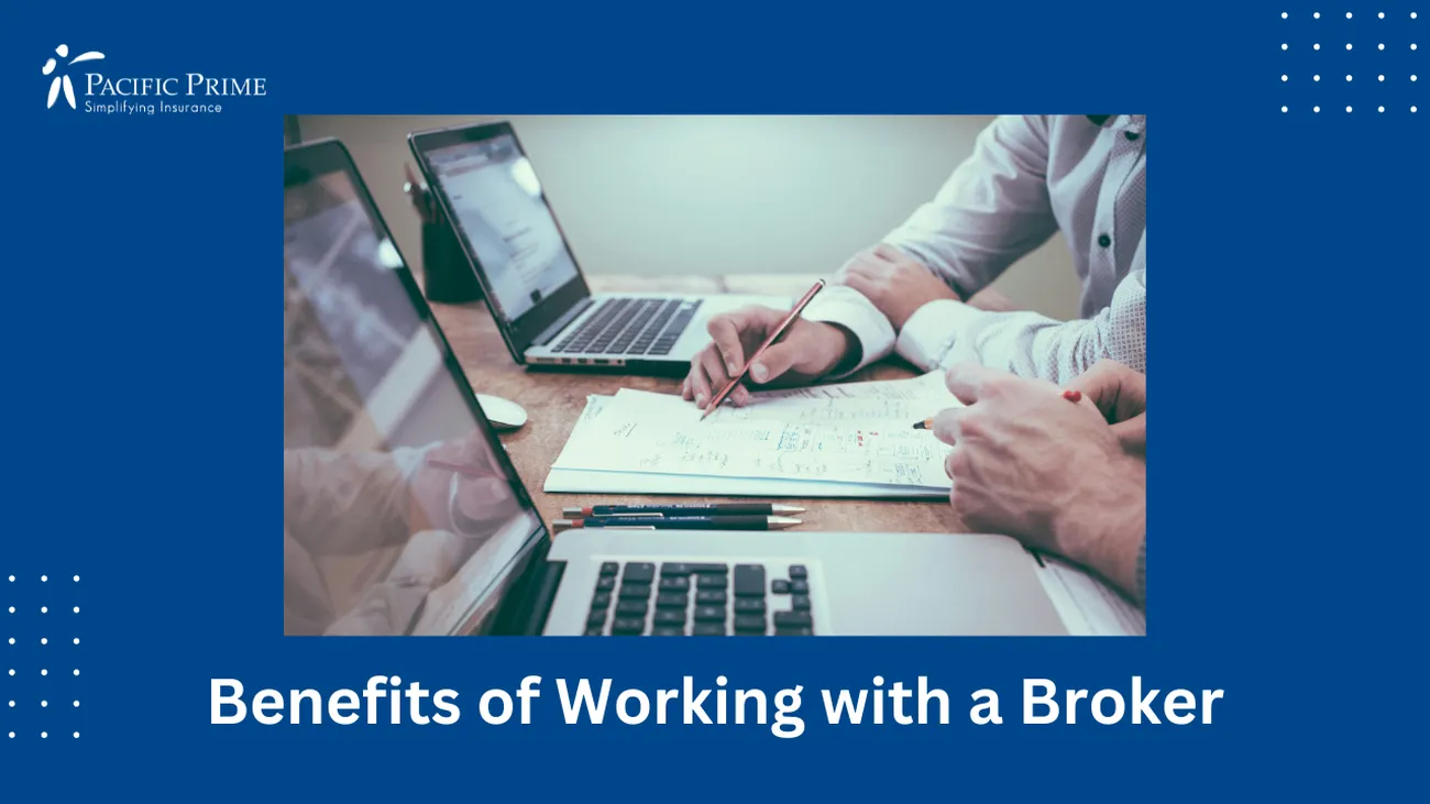 Image of Insurance Broker Discussing Policy, Brainstorming On Paper with text overlay of "Benefits of Working with a Broker"