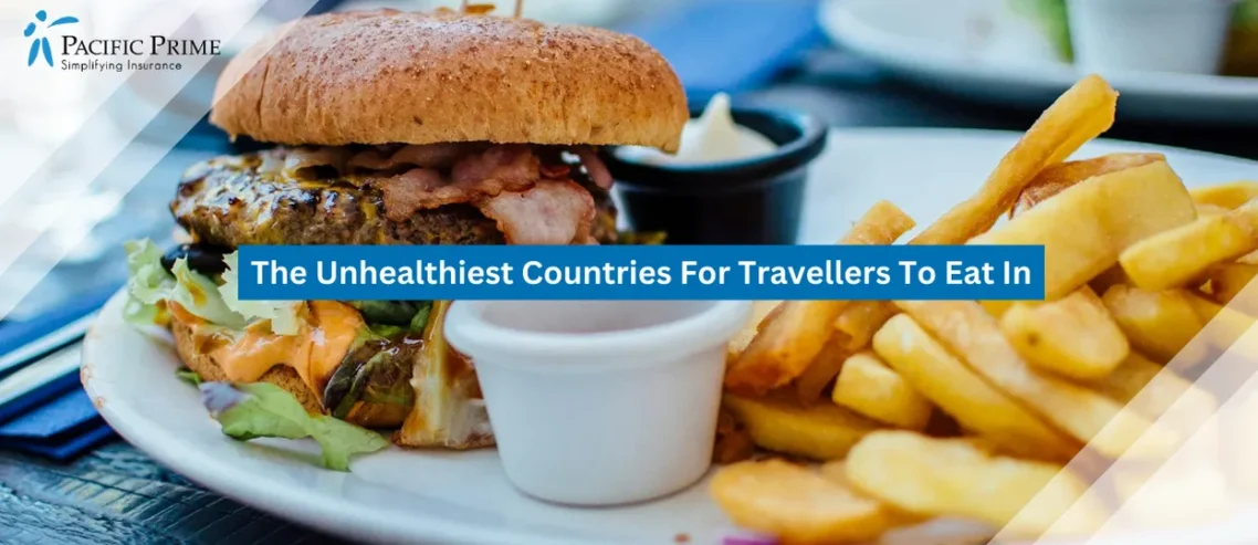 Image of Juicy Beef Burger With Melted Cheese Served On A Restaurant Plate with text overlay of "The Unhealthiest Countries For Travellers To Eat In"