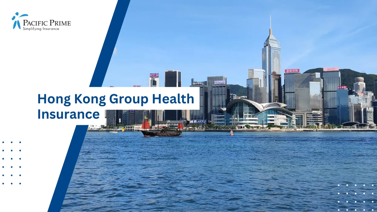 Image of Junk Boat Crossing Victoria Harbour With WAN Chai Towers Beyond with text overlay of "Hong Kong Group Health Insurance"