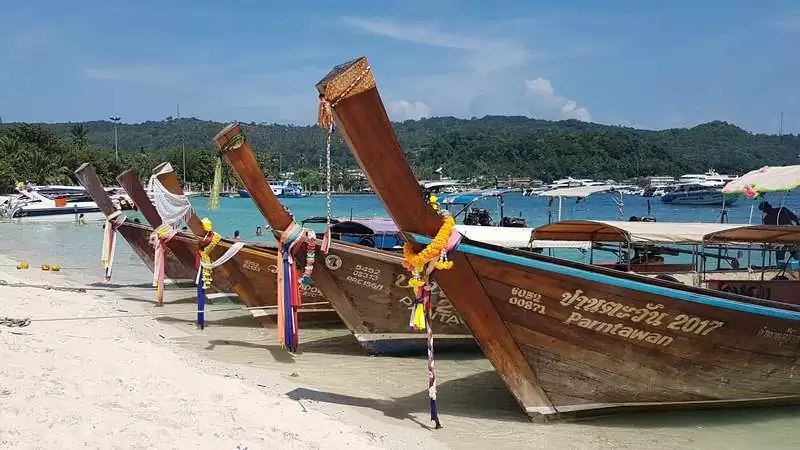 Krabi's Long-tail Boats: Allianz Ayudhya For Travelers
