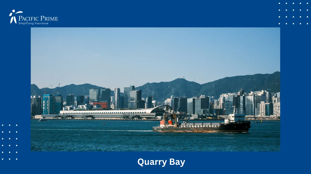 Image of Large Boat Sailing Across Water In Quarry Bay, Hong Kong with text overlay of "Quarry Bay"