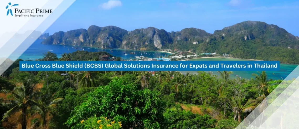 Image of Lush Phi Phi Coastline Beside Turquoise Waters Beneath A Clear Sky with text overlay of "Blue Cross Blue Shield (BCBS) Global Solutions Insurance for Expats and Travelers in Thailand"