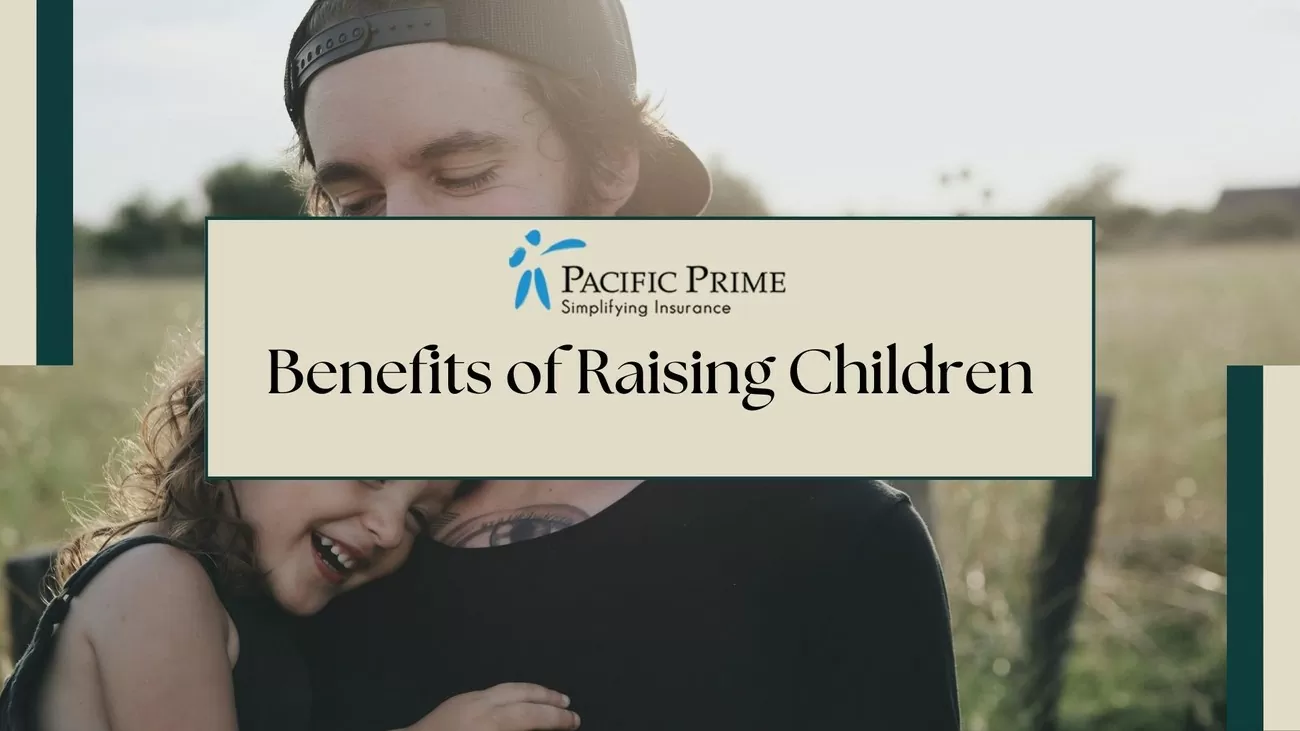 Image of a Man Holding Daughter In Black Top with text overlay of "Benefits of Raising Children"