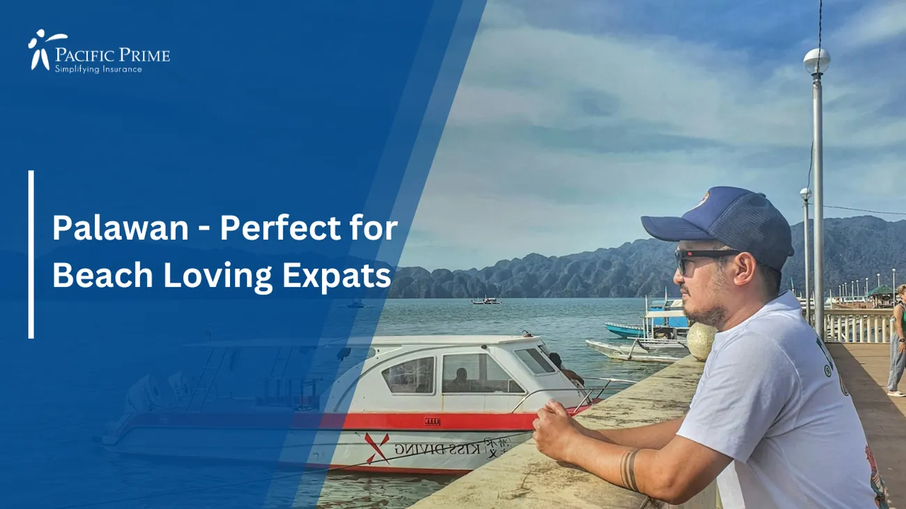 Image of Man On Pier Beside Boat In Coron, Palawan, Philippines with text overlay of "Palawan - Perfect for Beach Loving Expats"