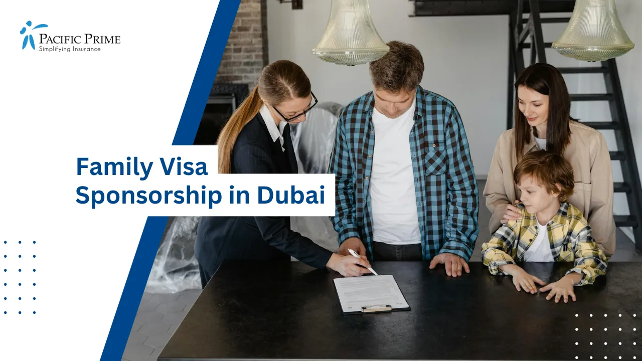 Image of Man Signing A Document On A Table with text overlay of "Family Visa Sponsorship in Dubai"