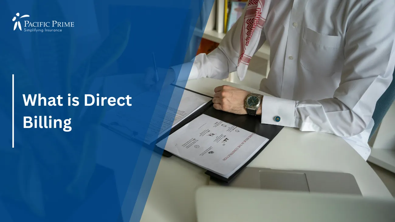 Image of a Man Writing Insurance Claim Details At A Desk with text overlay of "What is Direct Billing"