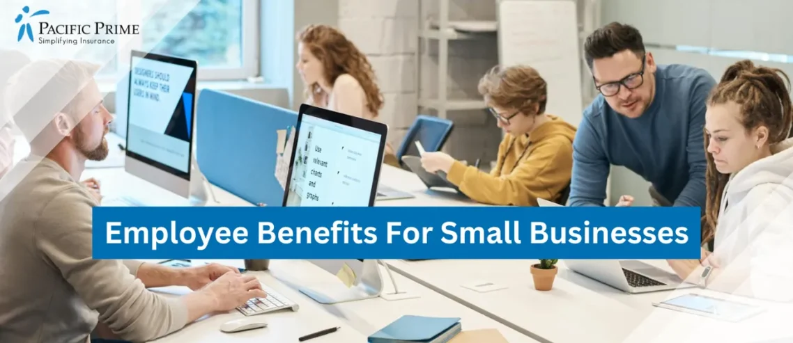 Image of Office Workers Using Computers In A Modern Workspace with text overlay of "Employee Benefits For Small Businesses"