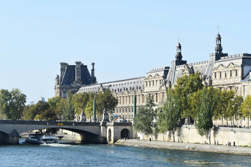 Paris Riverboat And Cityscape