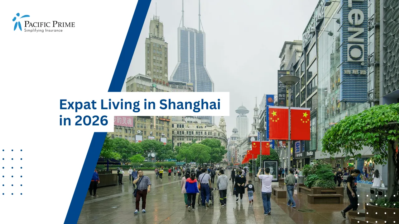 Image of Pedestrians Moving Through Nanjing Road Beneath Shanghai’s Cloudy High-rises with text overlay of "Expat Living in Shanghai in 2026"